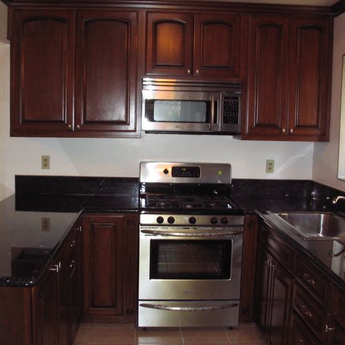 Install complete kitchen, cabinets, counter tops, 