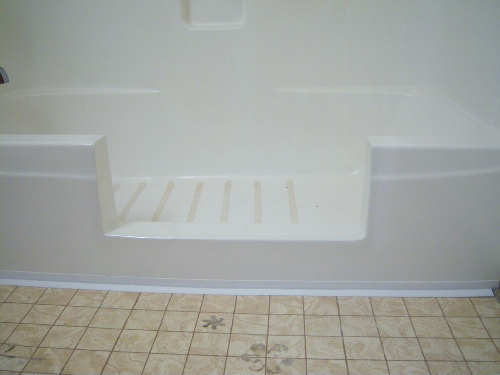 Bathtub after conversion to Handicap walk in showe