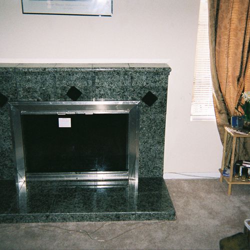 We put granite tile on the client's fire place.