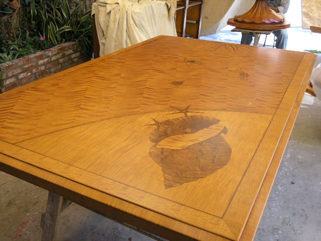Finished custom nautilus veneer inlay on in-house 