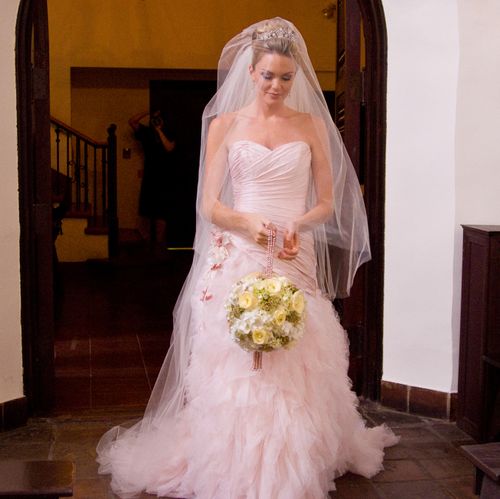 The brides dress is all chifon and the bouquet wei