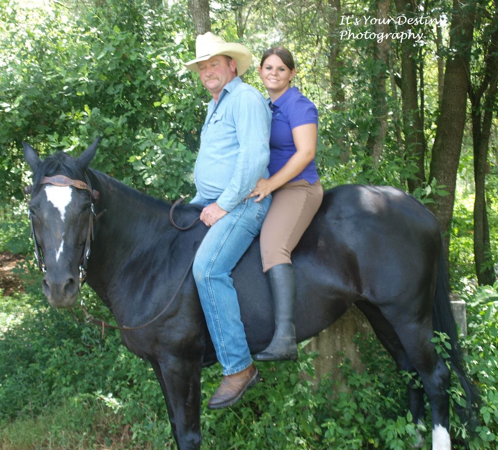 Mrs. Julie and Mr. Kevin and their horse Dance.