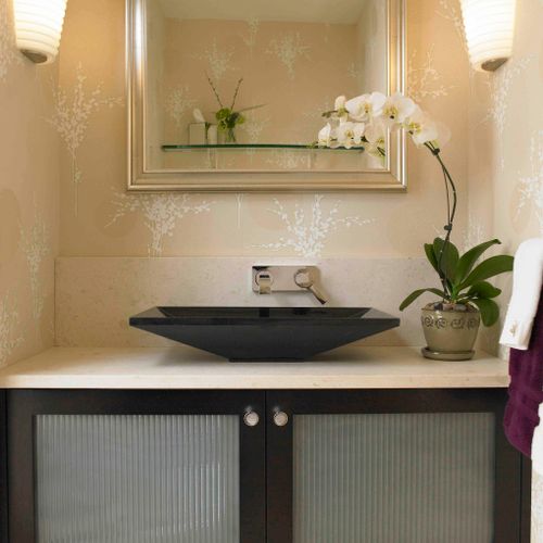 Modern vessel sink adds to the elegance of this Po