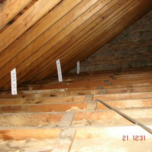 BEFORE BLOW-IN INSULATION - R14