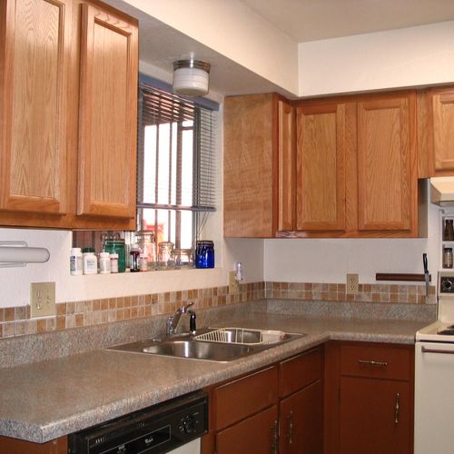 Designed and installed cabinets,countertop and til