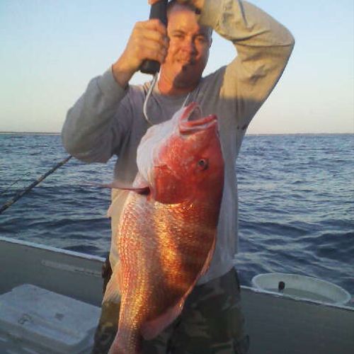 Captain Ben with a nice snapper! I consistently pu