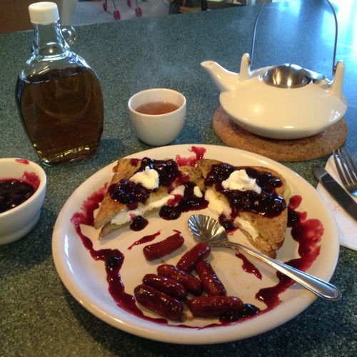 Vanilla cream french toast drizzled in blueberry s