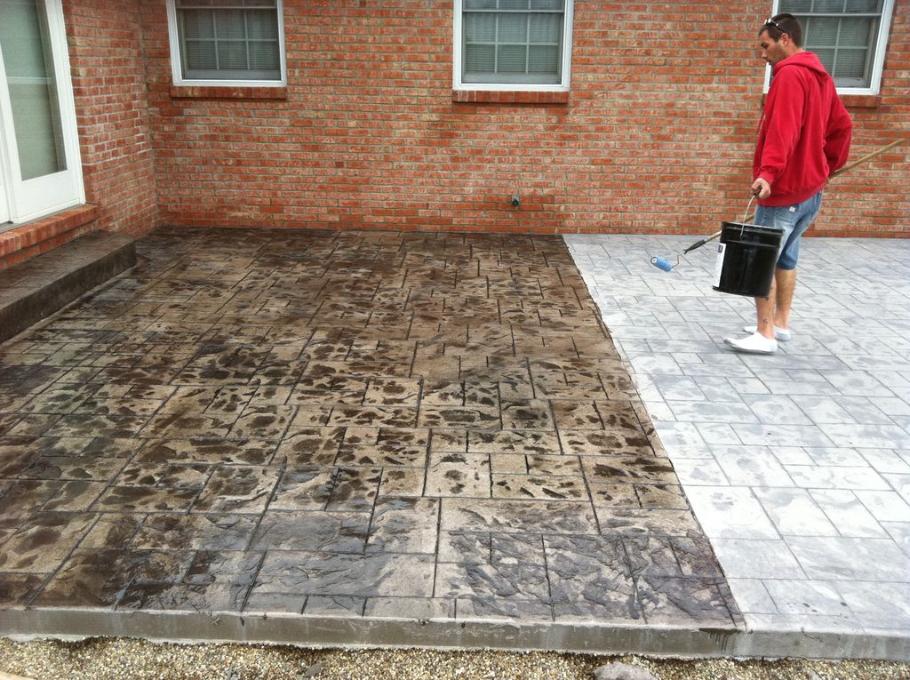 putting the finishing touch on a new stamped patio