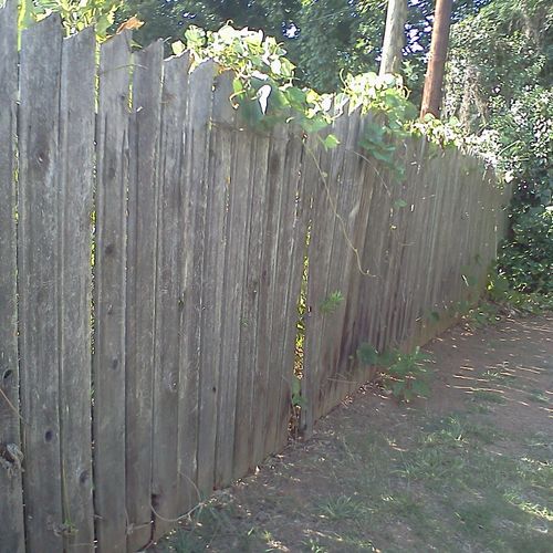 A before pic of a fence we replaced