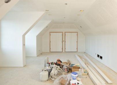 A remodeled Attic completed by Stio Roofing and Co