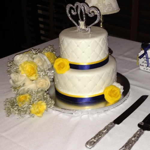Beautiful Wedding Cake made by our Baker!! Very af