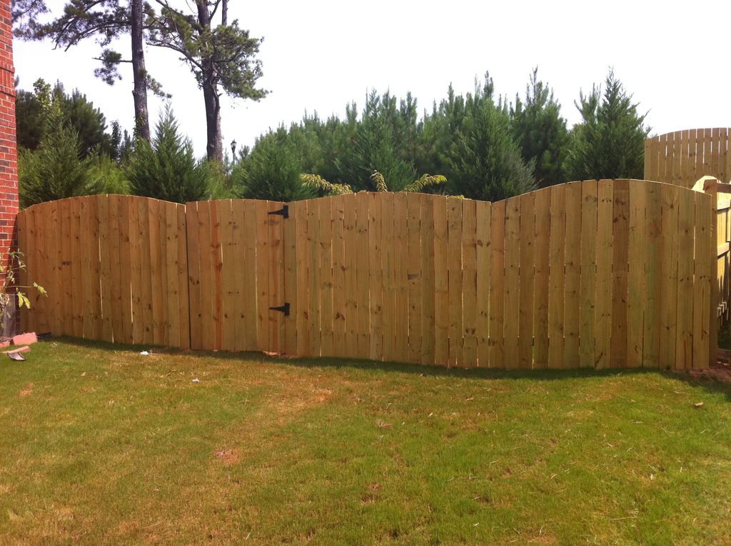 the right side of the arched privacy fence