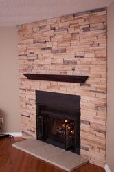 Brick, stone and rock fireplace