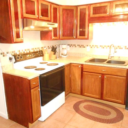 we did all the cabinets,sink,tiled the back splash