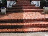Brick, cement and asphalt surfaces pressure washed