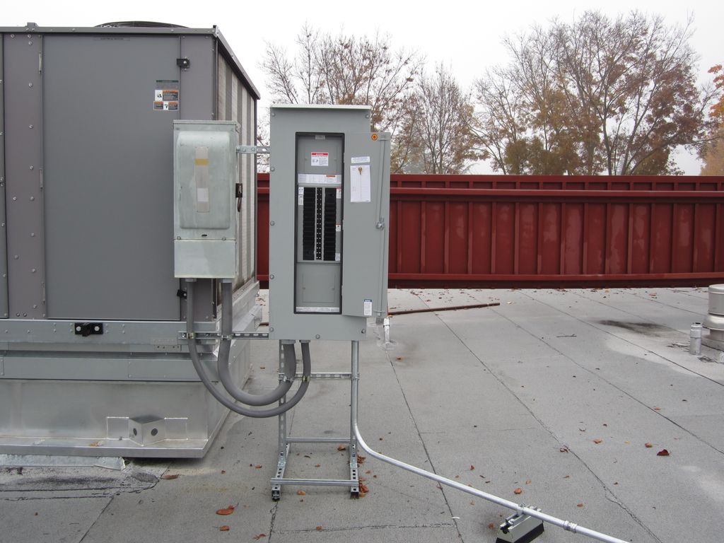 This is a subpanel on a commercial roof for a manu