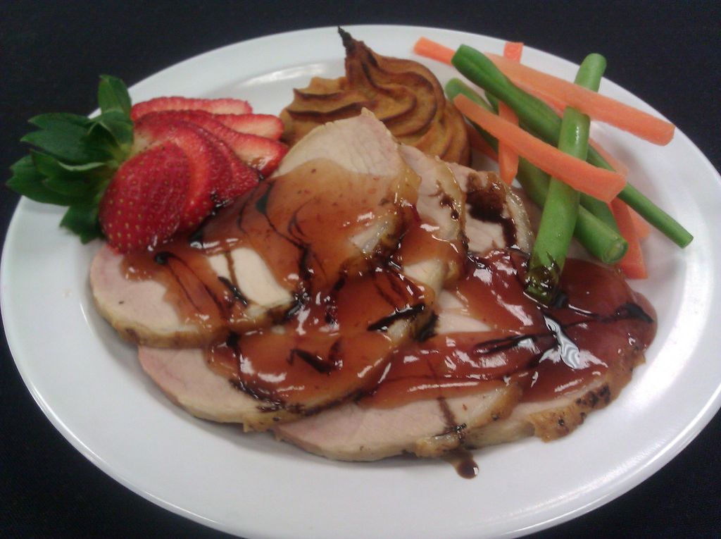 Sliced Roast Porkloin with a Strawberry Chipote' G