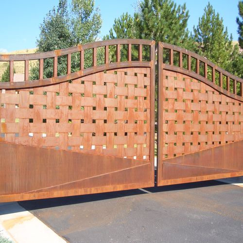 Cor-ten gates with openers.  21' wide and 11' tall