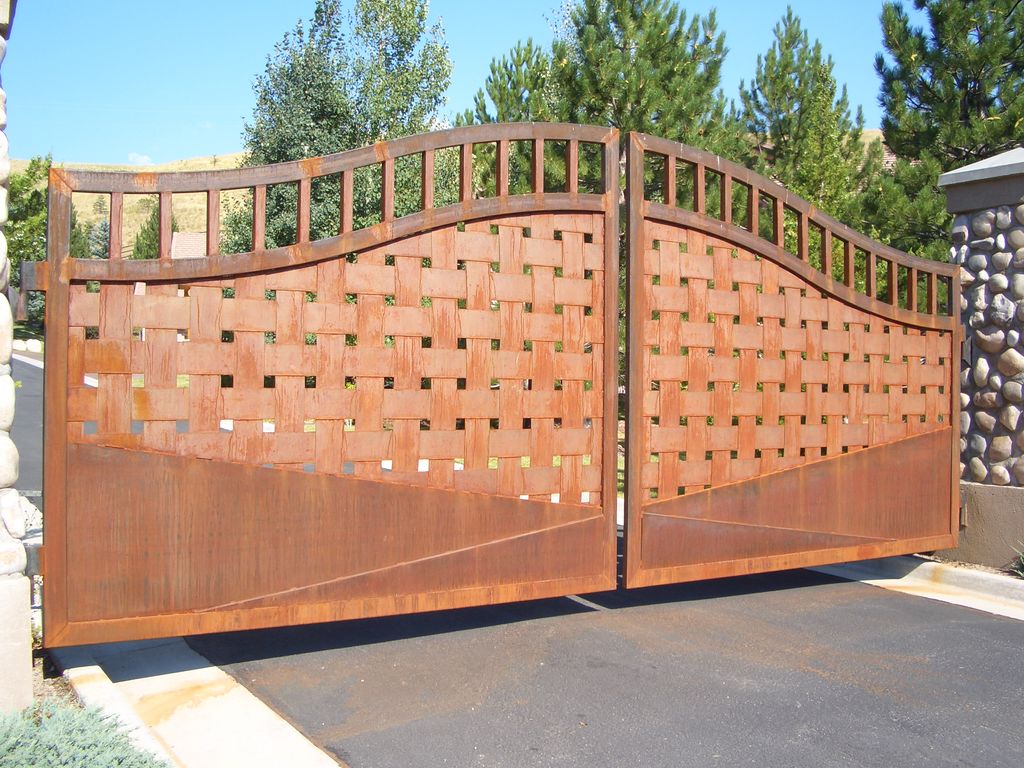Cor-ten gates with openers.  21' wide and 11' tall