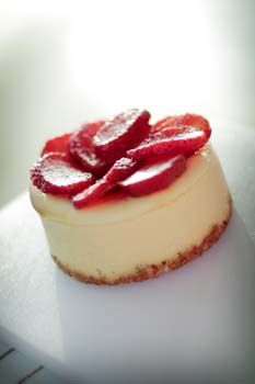 Individual strawberry cheesecake.