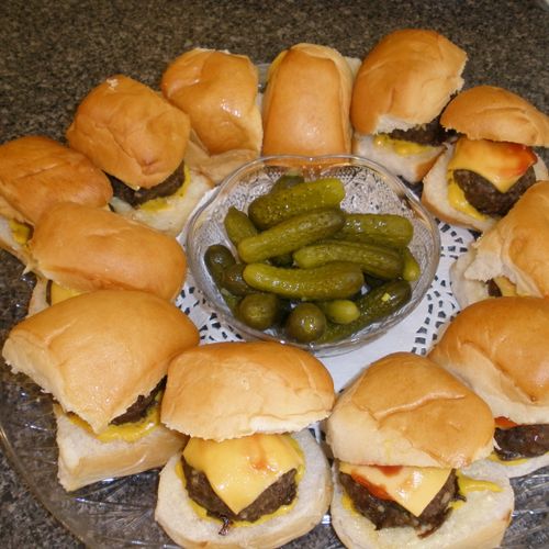 Beef Sliders garnished with
Organic Baby Pickles