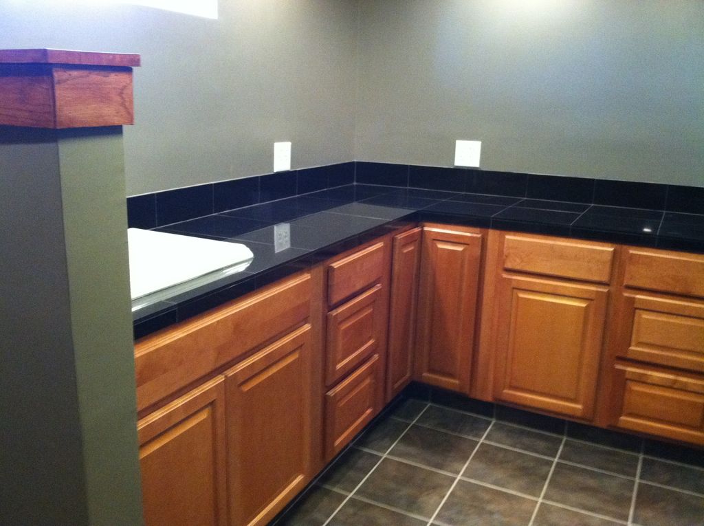 Custom Granite tile counter top in spacious bathro