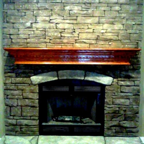 Add carved concrete to enhance your fireplace.