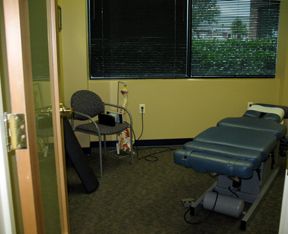 Private treatment rooms for exams, chiropractic th