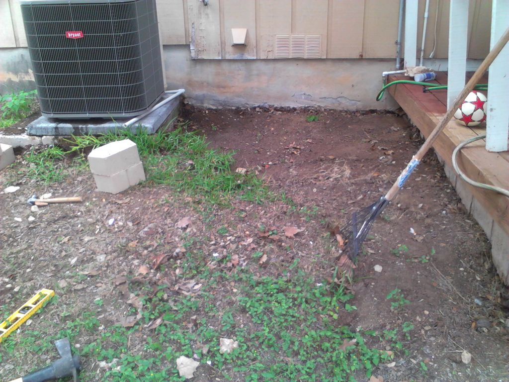 BEFORE WE DID THE RETAINING WALL AND GRAVEL AND PA