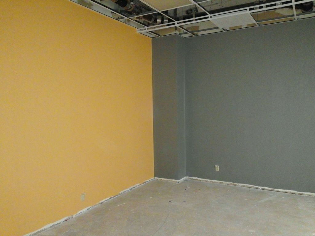 First coat of adjacent colors in office remodel.