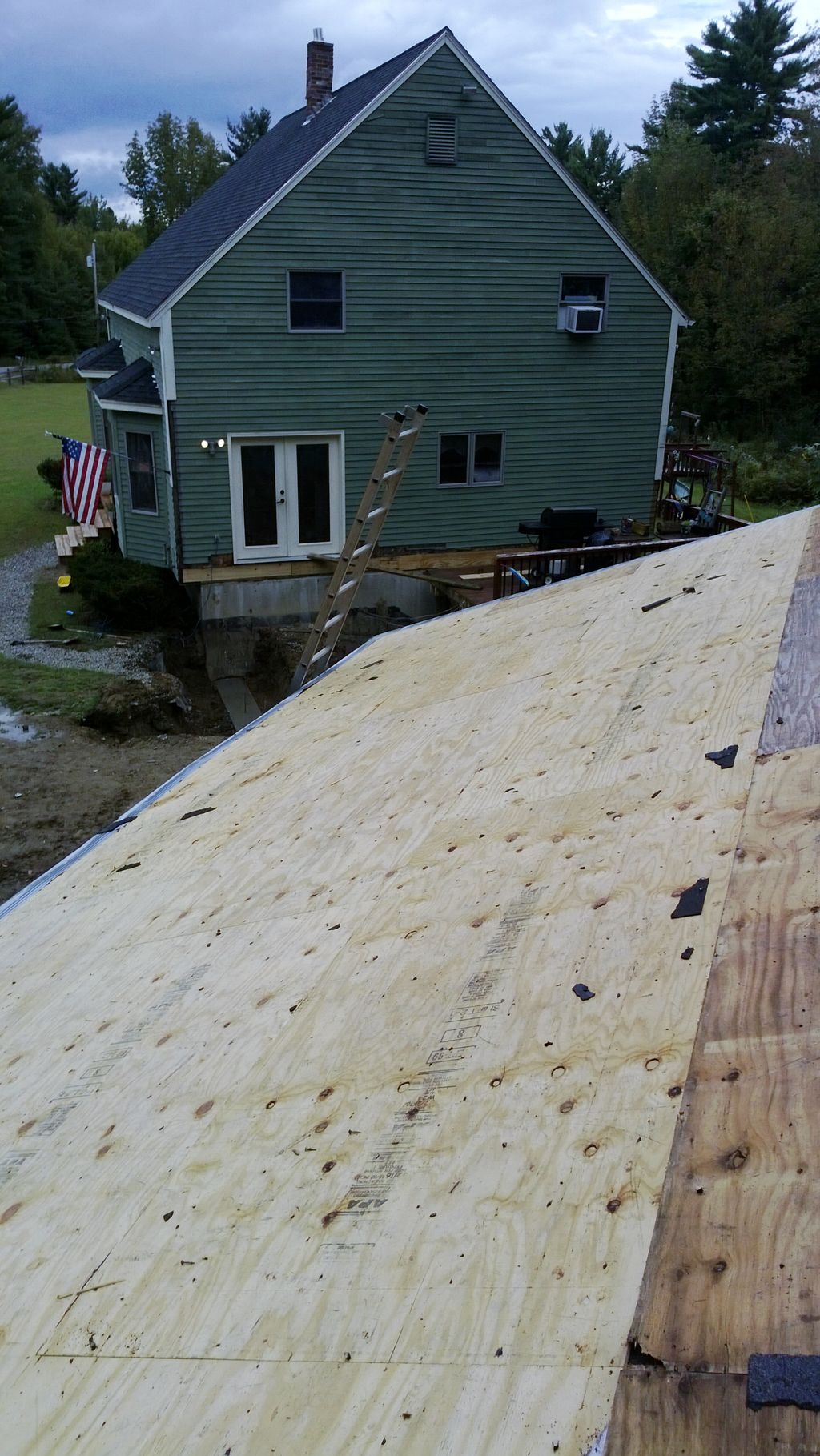 roof stripped on garage, new foundation for additi