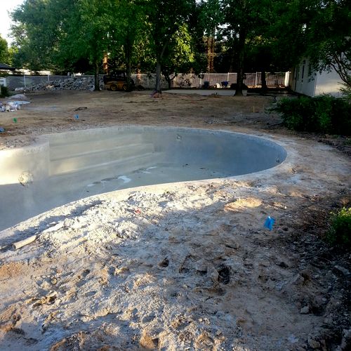 before picture of pool area at Len Residence