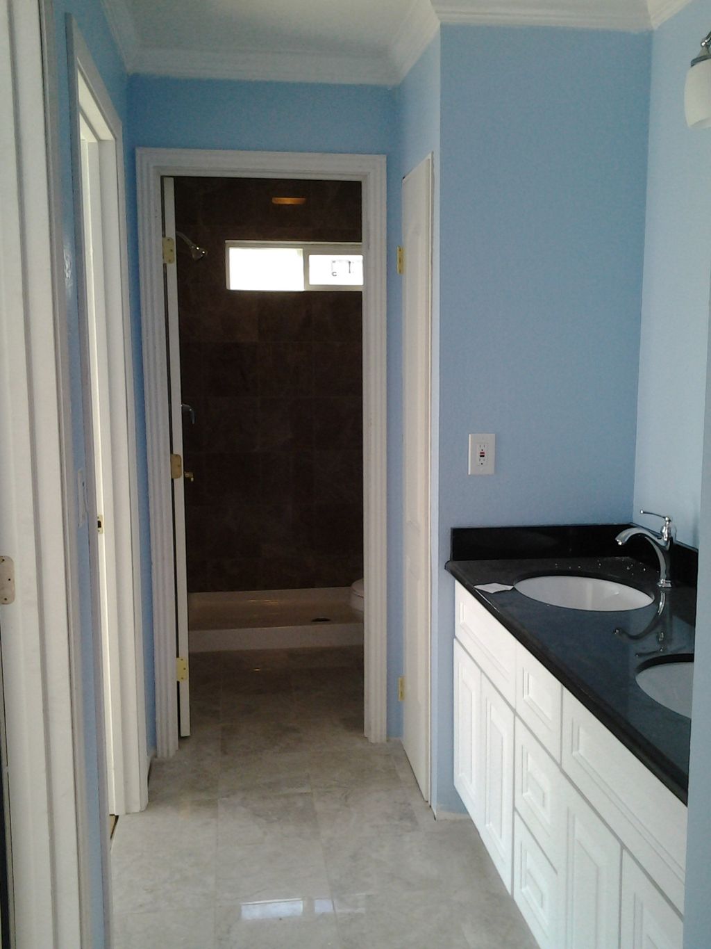 Yin (after) Bathroom Granite shower, floors & Coun