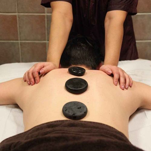 Therapeutic massage that uses smooth, warm volcani