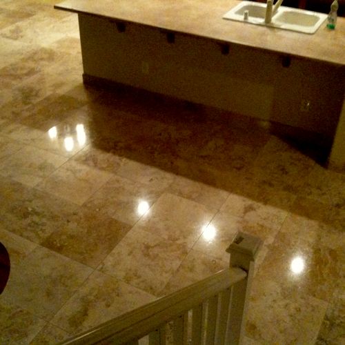 Travertine cleaned, honed  and sealed.