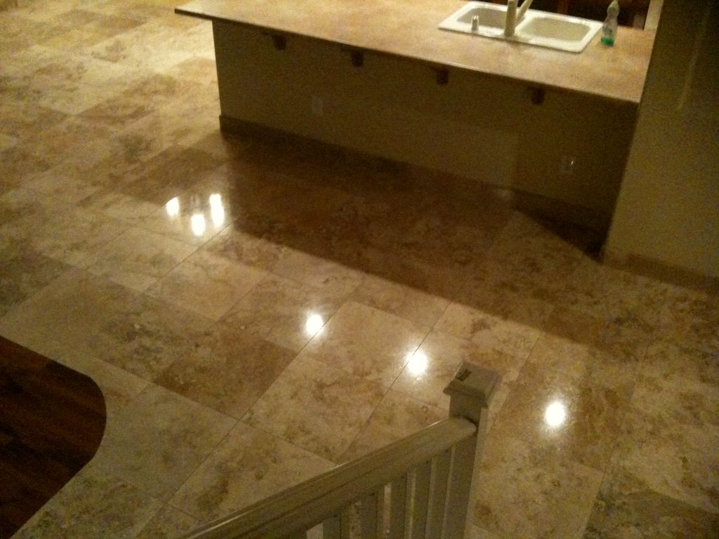 Travertine cleaned, honed  and sealed.