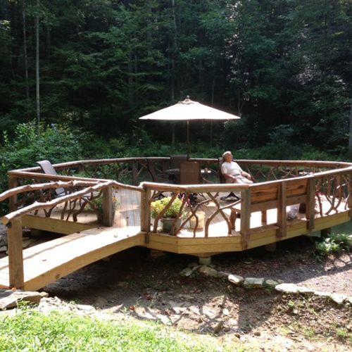 Cantilevered deck with arch bridge
