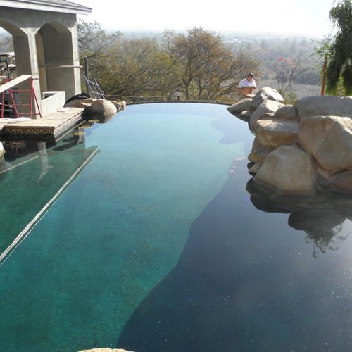 Swimming Pool Remodel, Tile, Plaster, and Landscap