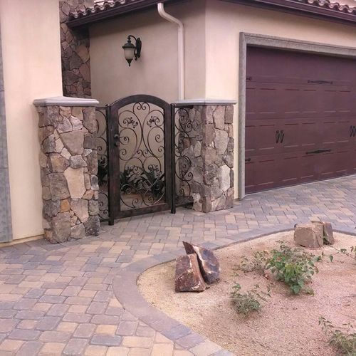 Desert scape front yard with interlocking pavers