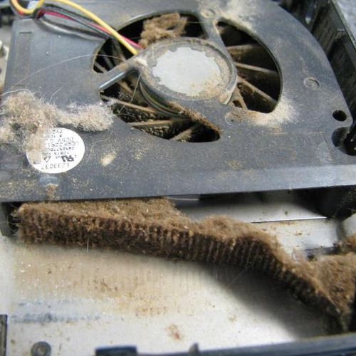 Clogged cooling system on a laptop.  We offer note