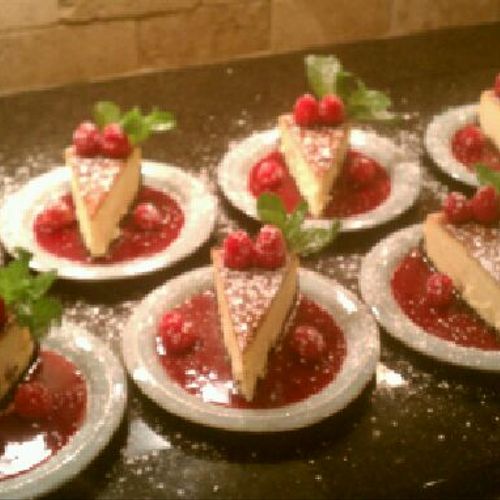 Vanilla Bean Cheesecake with Raspberry Coulis