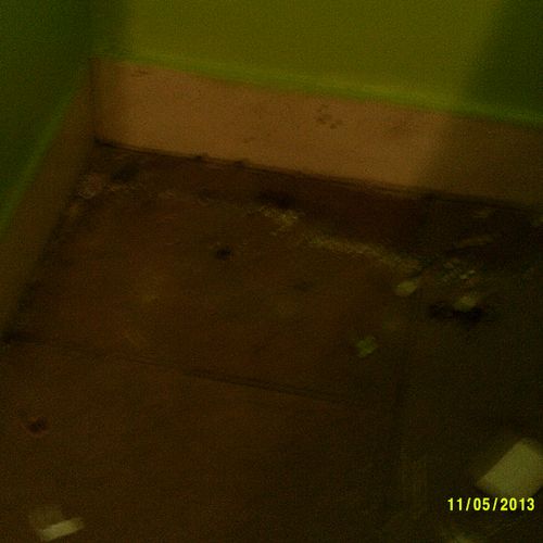 Before
An old floor w/ cracked tile, w/ Dirty old 