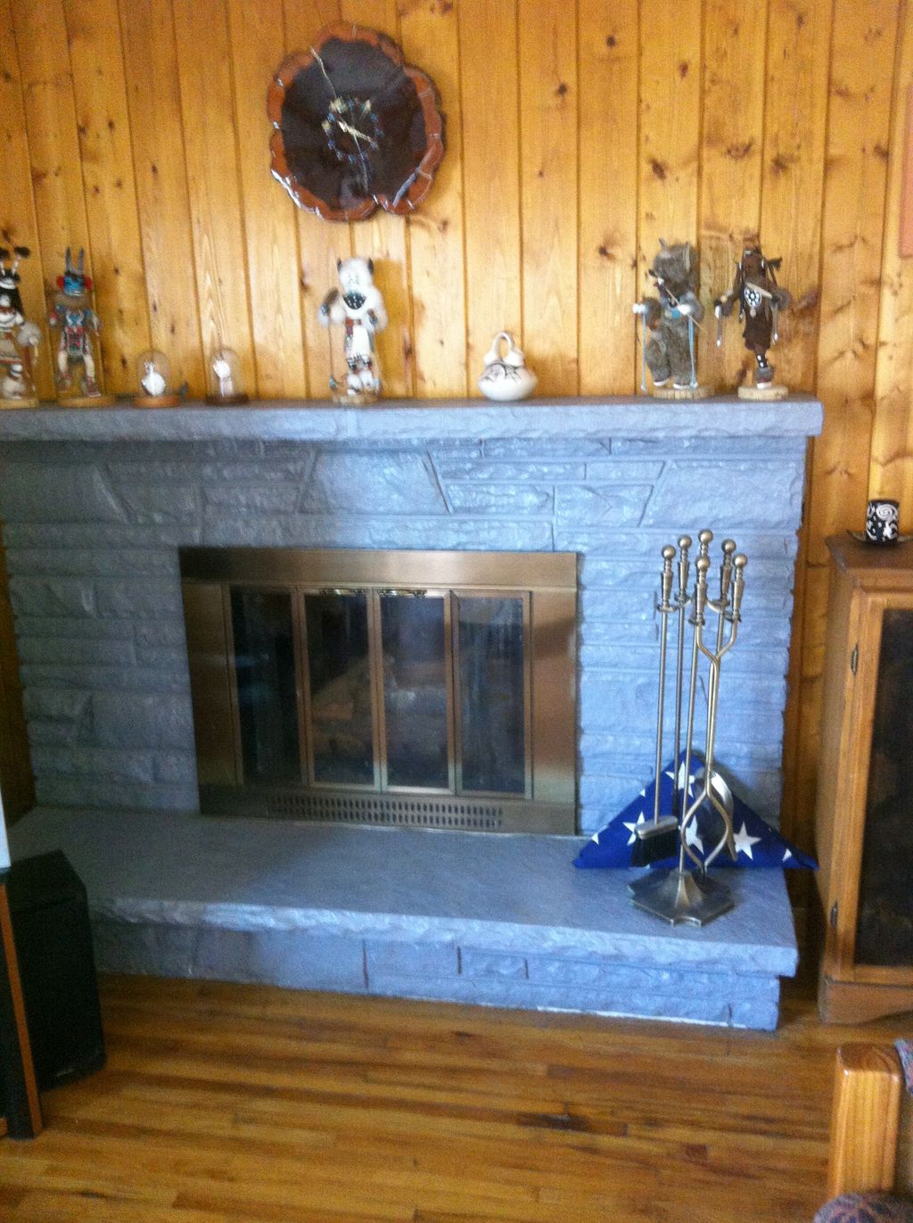 This fire place had been painted a dull grey that 
