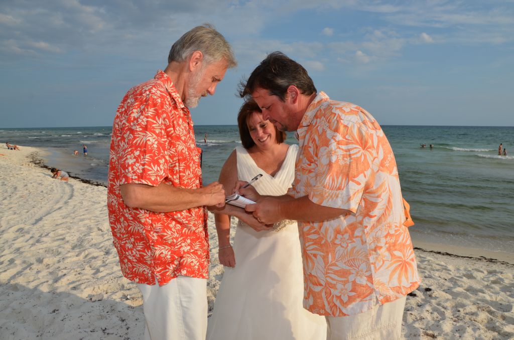 Officiant Walter finishes the legal details after 