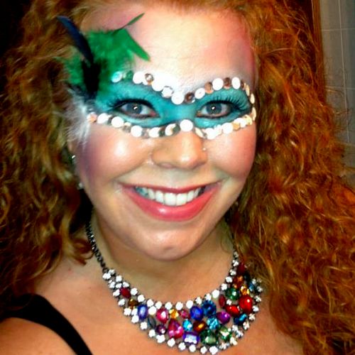 Makeup masquerade.  Eye makeup, sequins and feathe