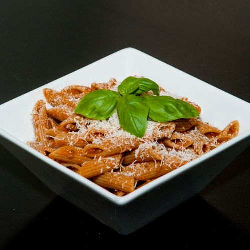 Whole wheat penne with bolognese sauce.