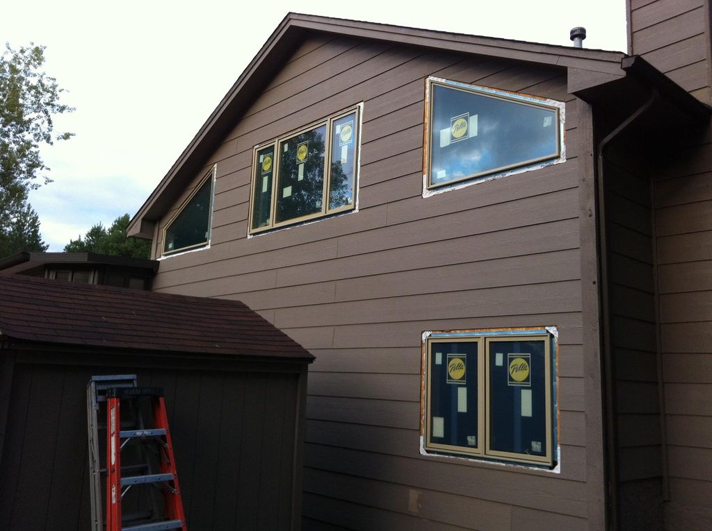 5 new Pella windows. (one hidden by shed)