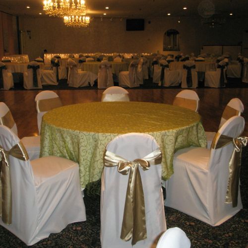 Ivory chair covers with champagne satin sash and m