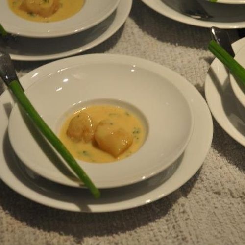Seared scallops Thai red curry sauce By AOC Las Ve