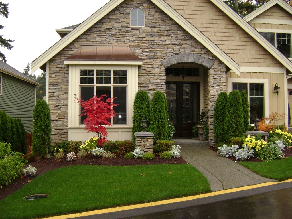 Cultured stone with copper roof entry trim pieces